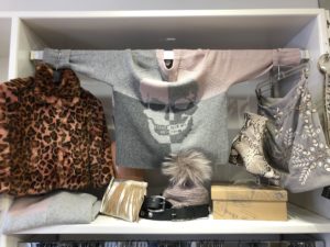 grey pink skull sweater cheetah jacket bling skirt and pom pom hat